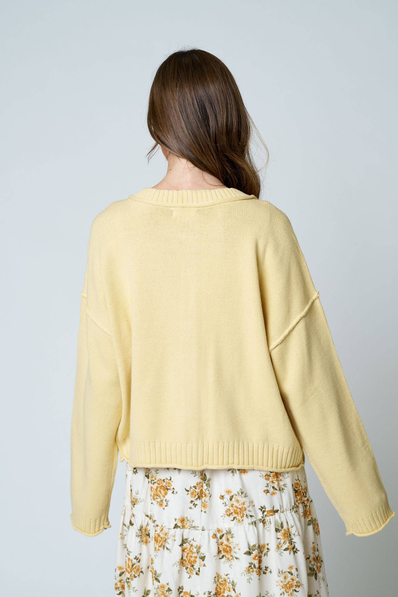 Raw Edge Button Down Knit CardiganRAW EDGE EXPOSED SEAM BUTTON DOWN KNIT CARDIGAN