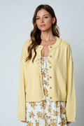 Raw Edge Button Down Knit CardiganRAW EDGE EXPOSED SEAM BUTTON DOWN KNIT CARDIGAN